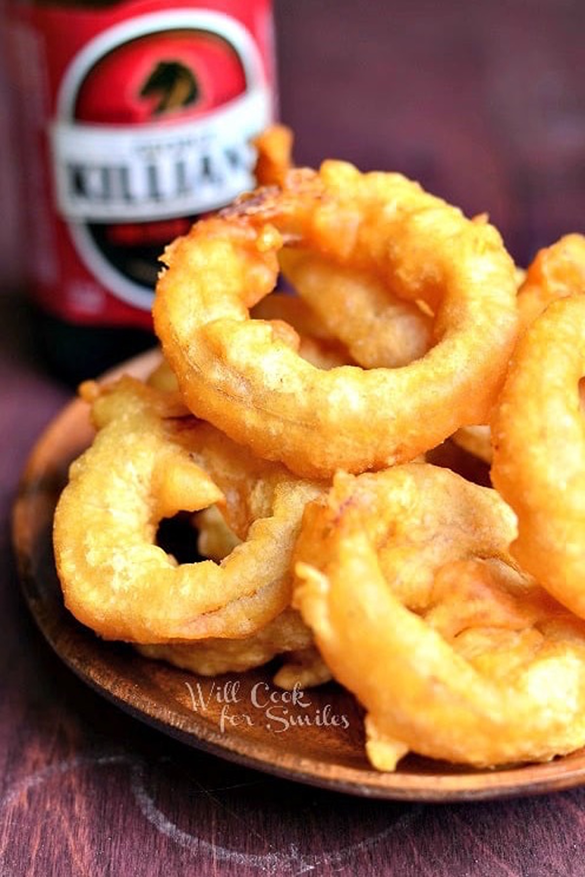 Golden fried onion rings with crispy beer batter.