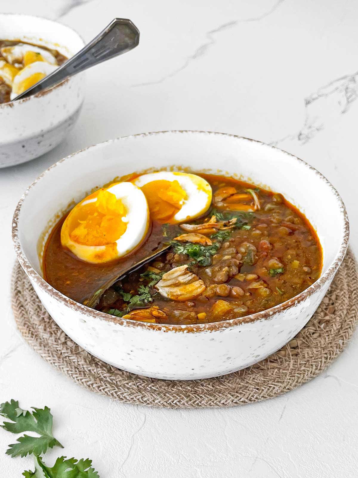 Two bowls of lentil soup.