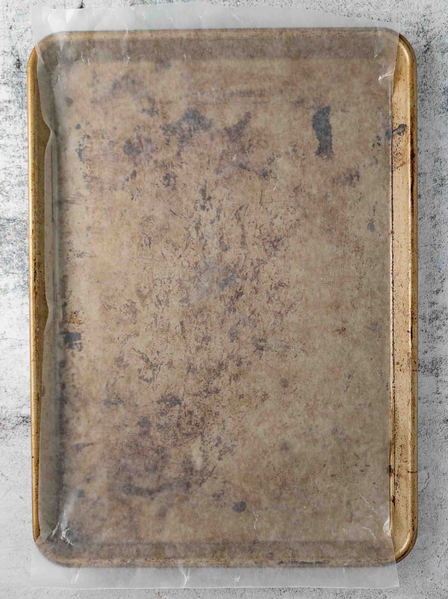 Baking sheet with wax paper lining.