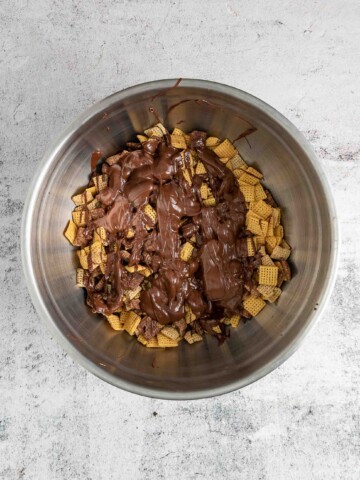 Melted chocolate poured over Chex cereal.