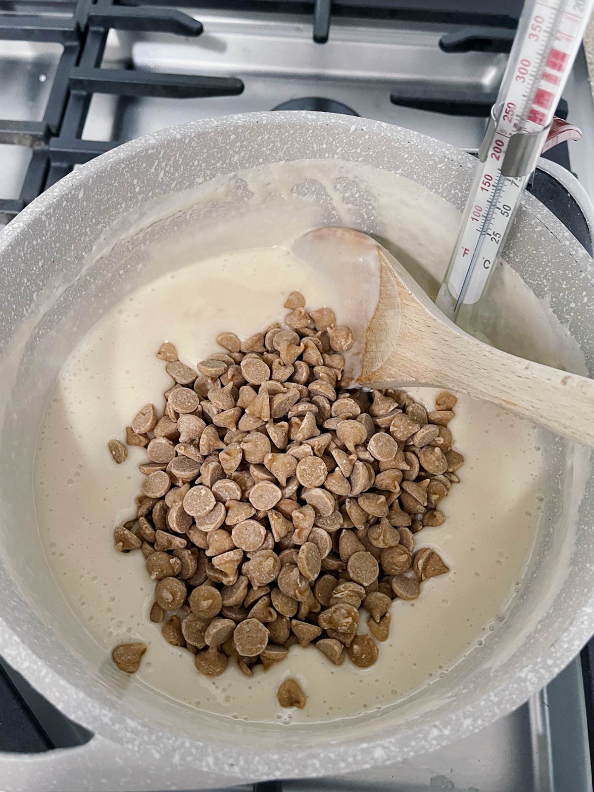 Peanut butter chips added to hot sugar mixture.