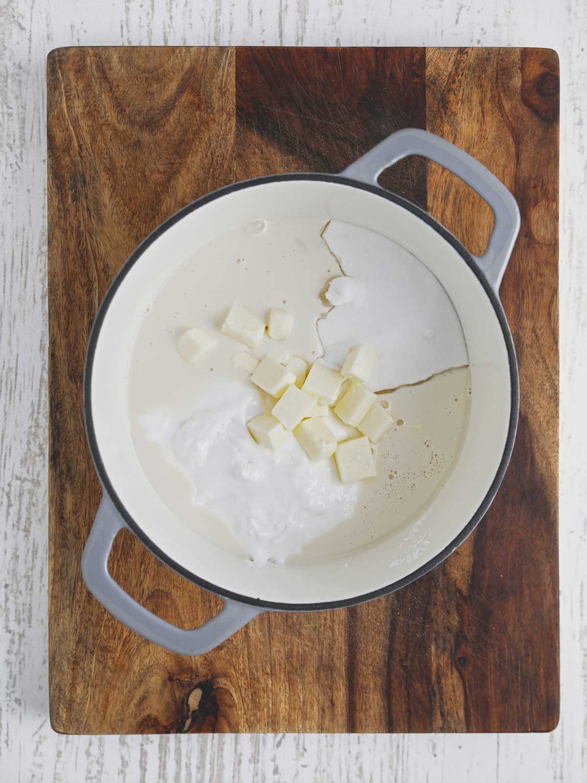 Heavy pot with condensed milk , sugar, butter, salt, and marshmallow creme.