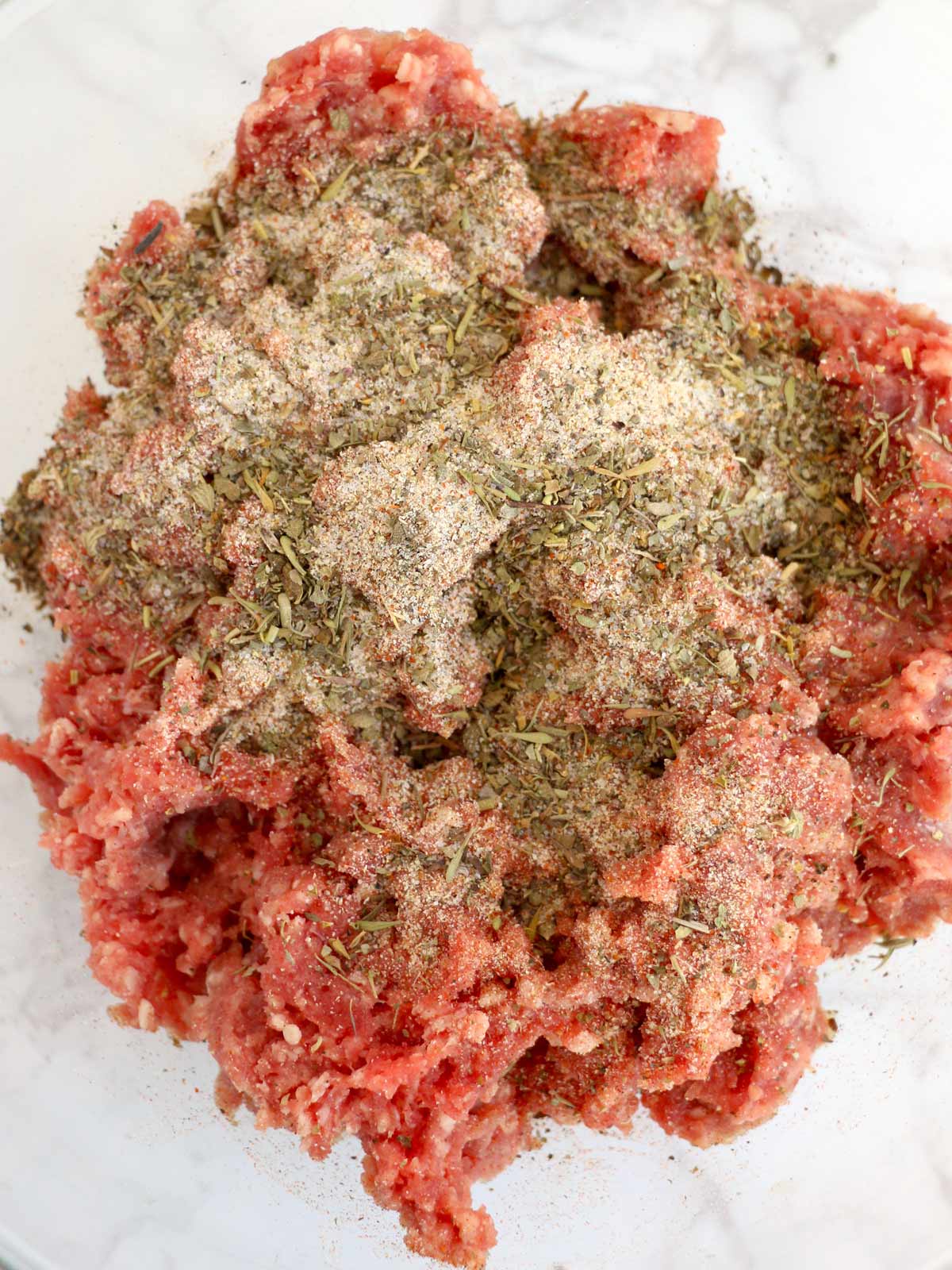 Seasoning added to ground beef.