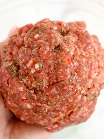 Ball of ground beef with seasonings added.
