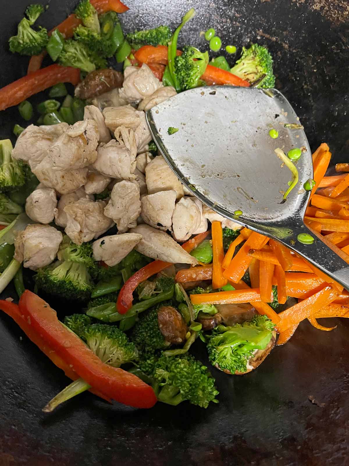 Chicken added back to the wok.