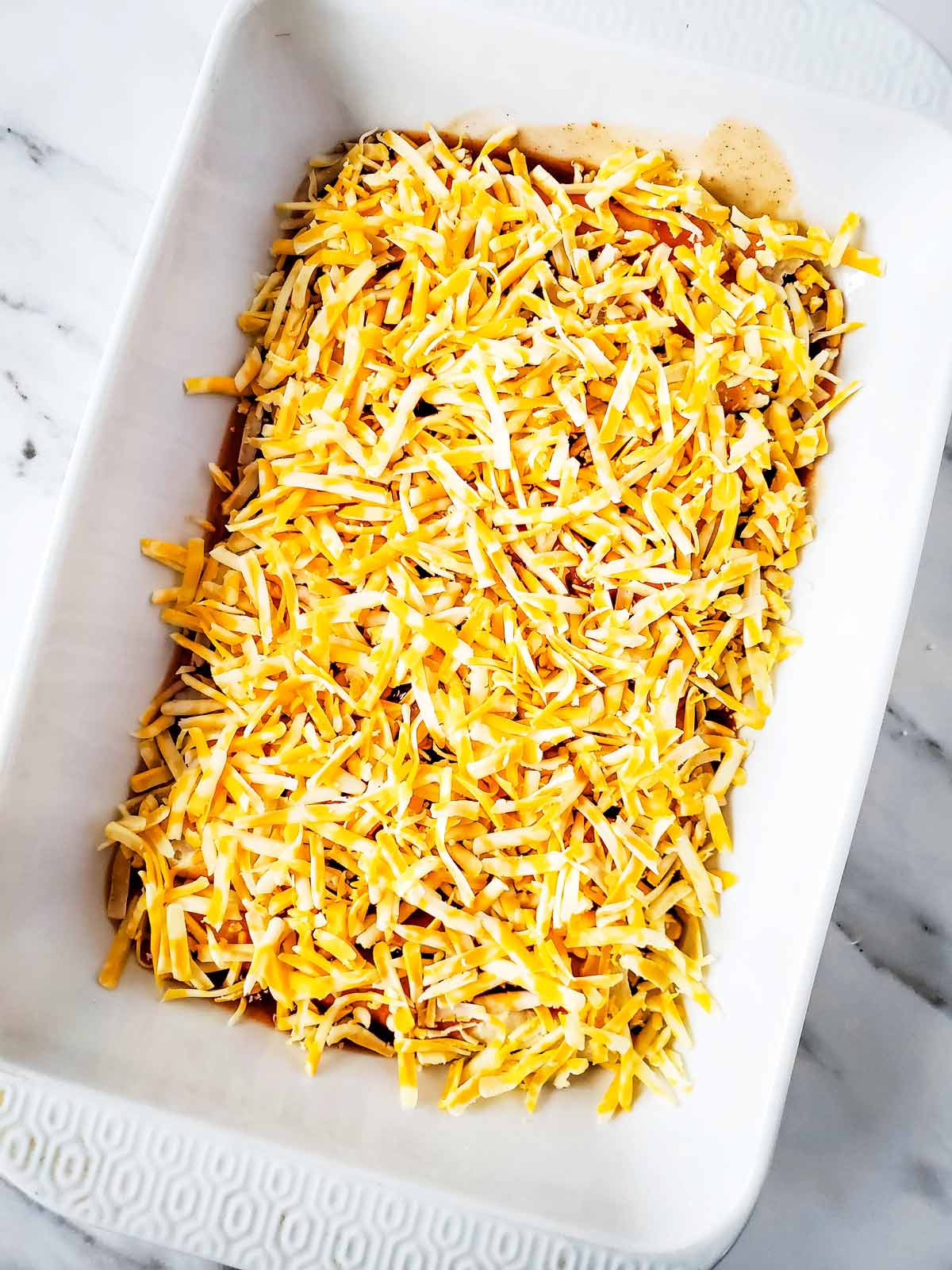 Casserole topped with grated cheese.