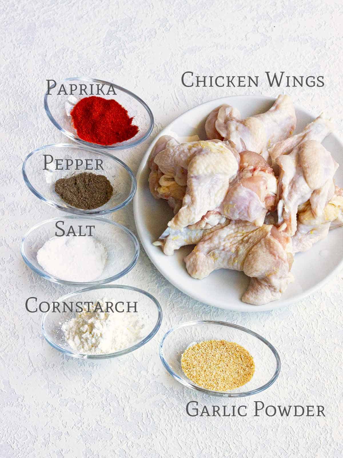 The ingredients for Best Crispy Chicken Wings In a PowerXL Air Fryer.