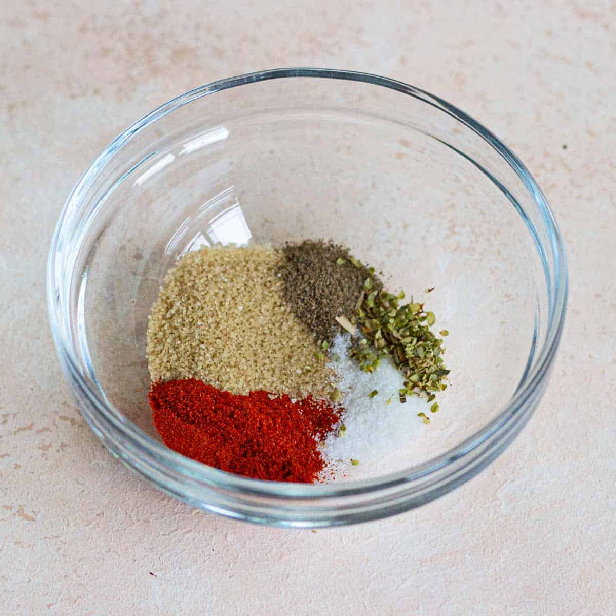 Small bowl with spices and seasonings for salmon.
