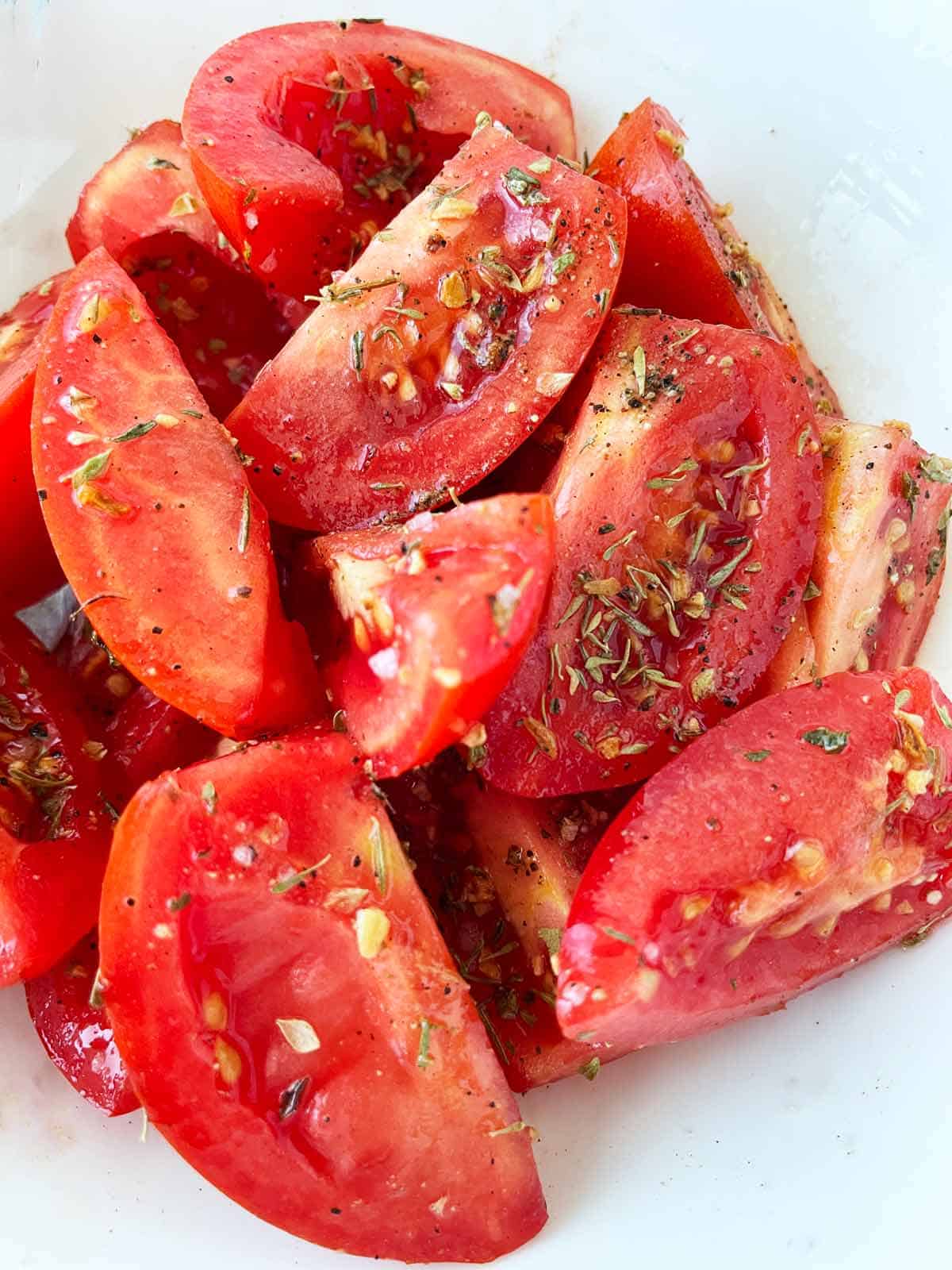 Tomatoes with seasonings.