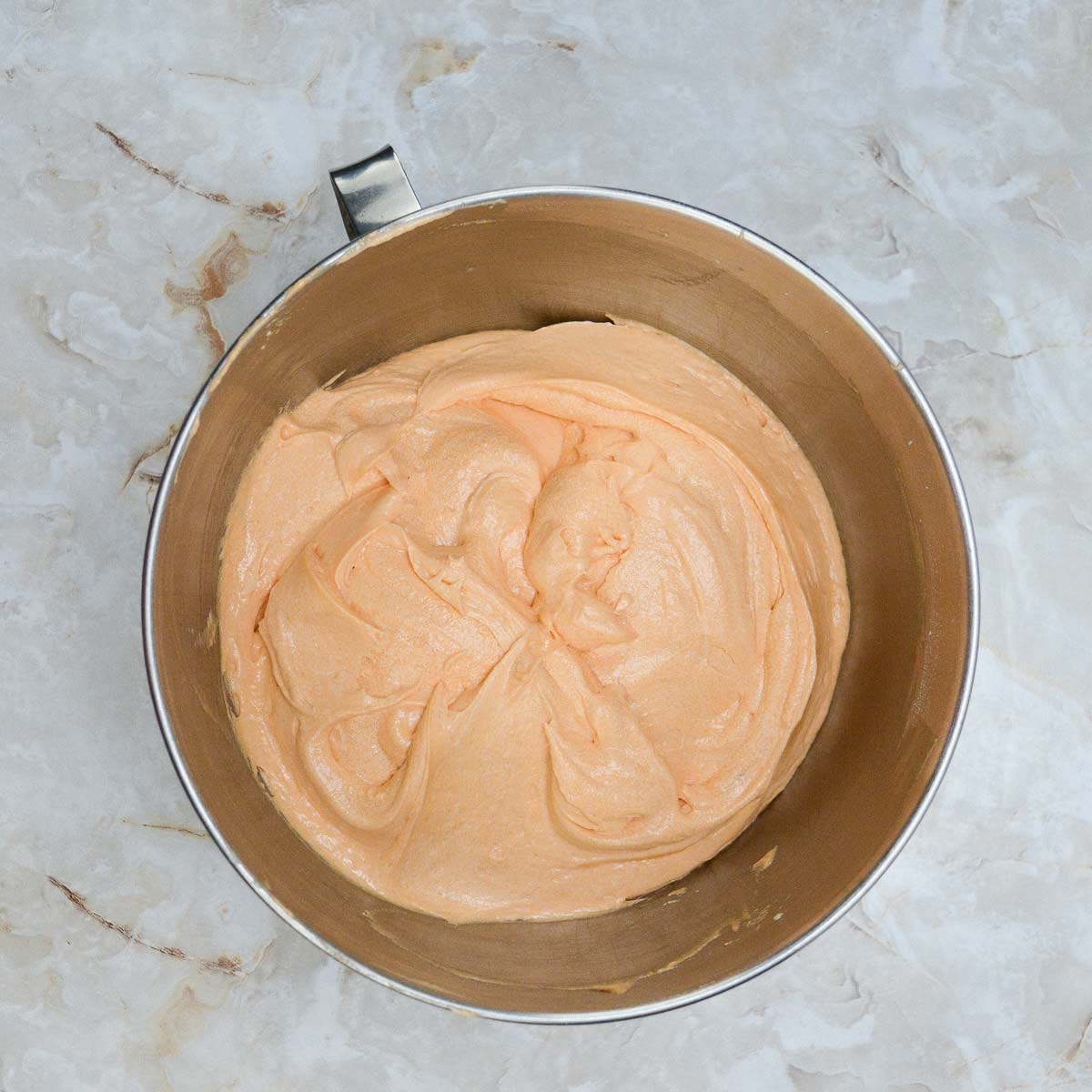 Orange cake batter in the mixing.