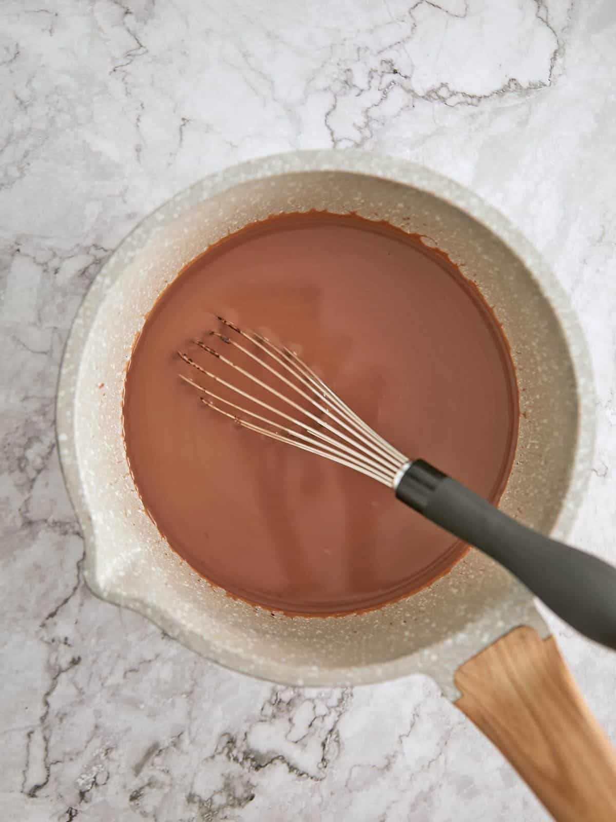 All the ingredients the coffee cream whisked together in the pot.
