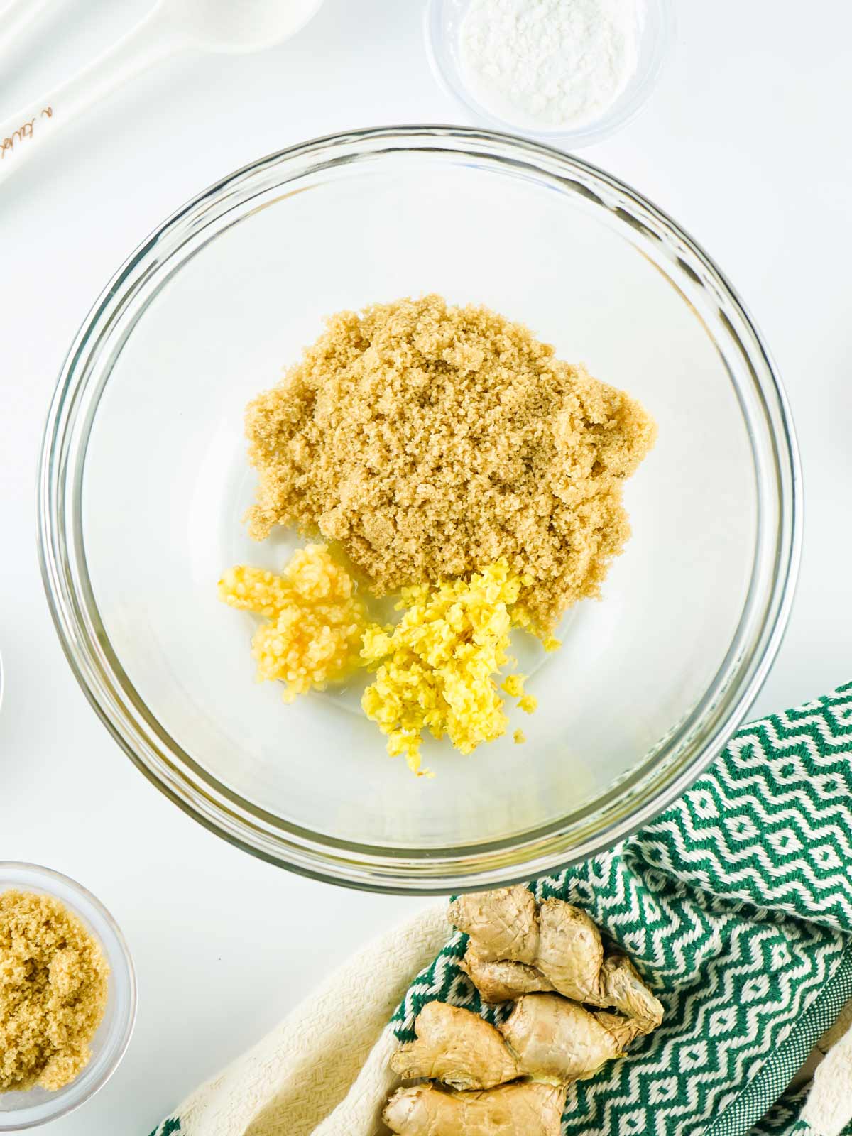 Bowl with ginger, garlic, and brown sugar.