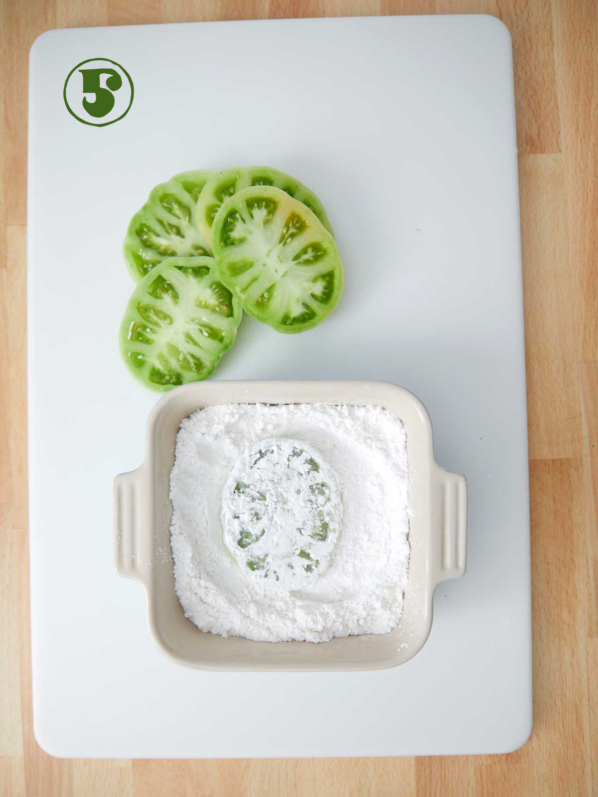Dish of flour and fried green tomato.