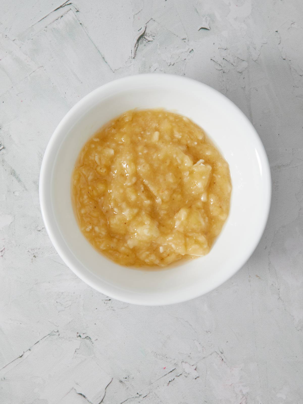 Mash the bananas with a fork and mix with the lemon juice. Set aside.