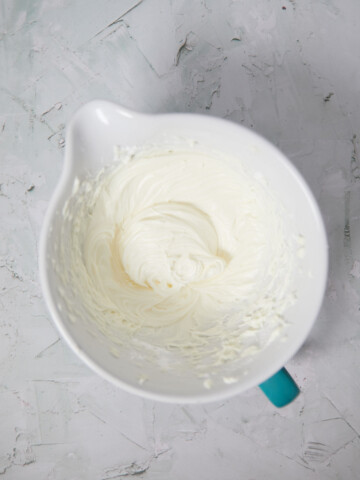 Mixing bowl with cream chese frosting.