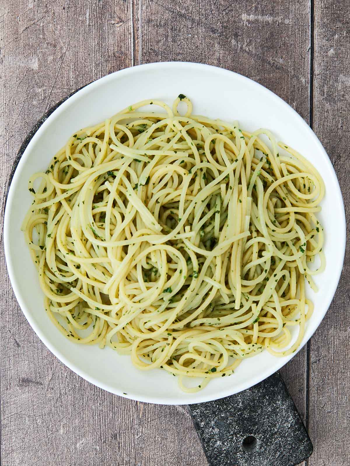 Pasta mixed with pesto.