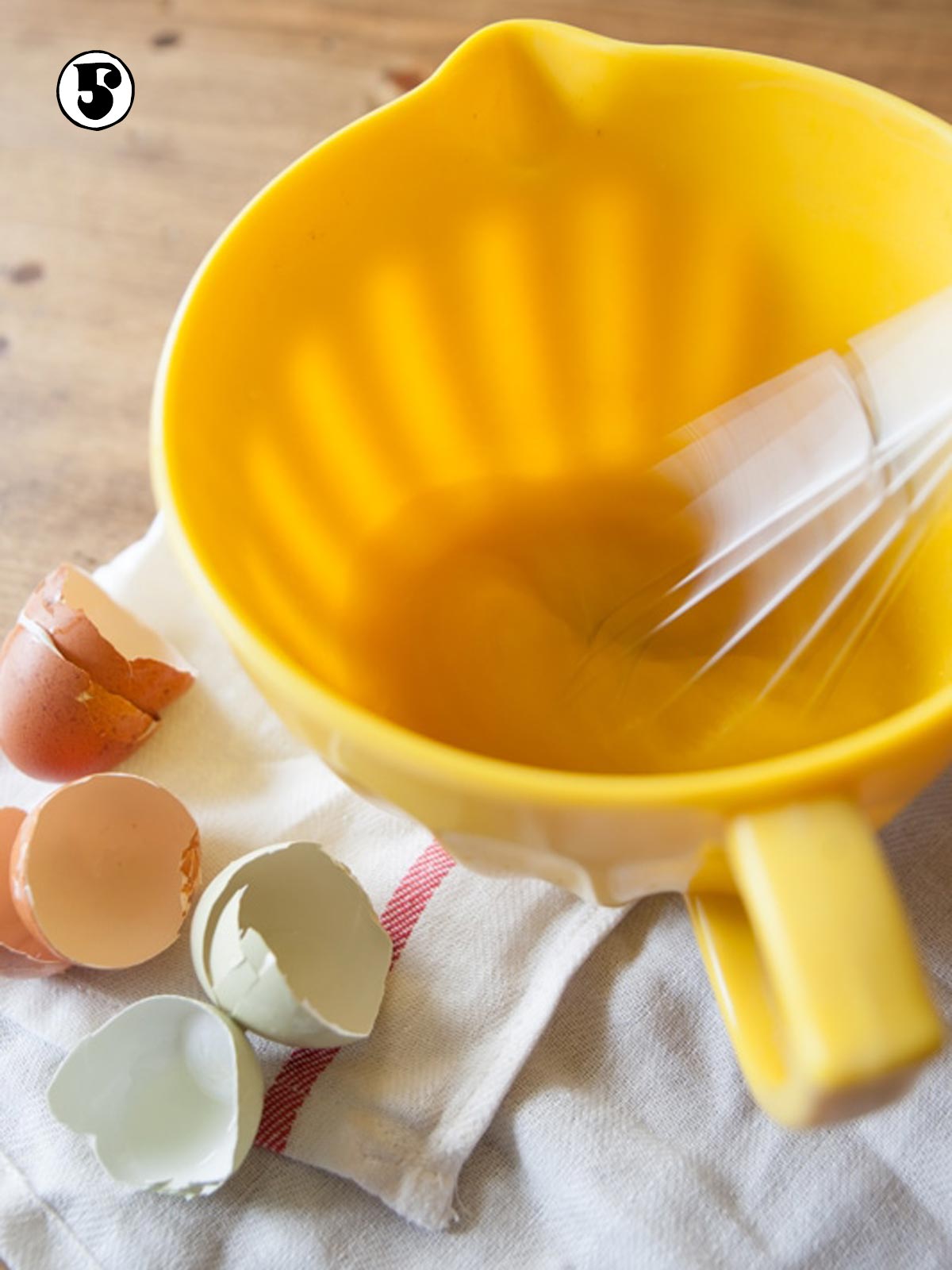 Whisking the wet ingredients in mixing bowl.