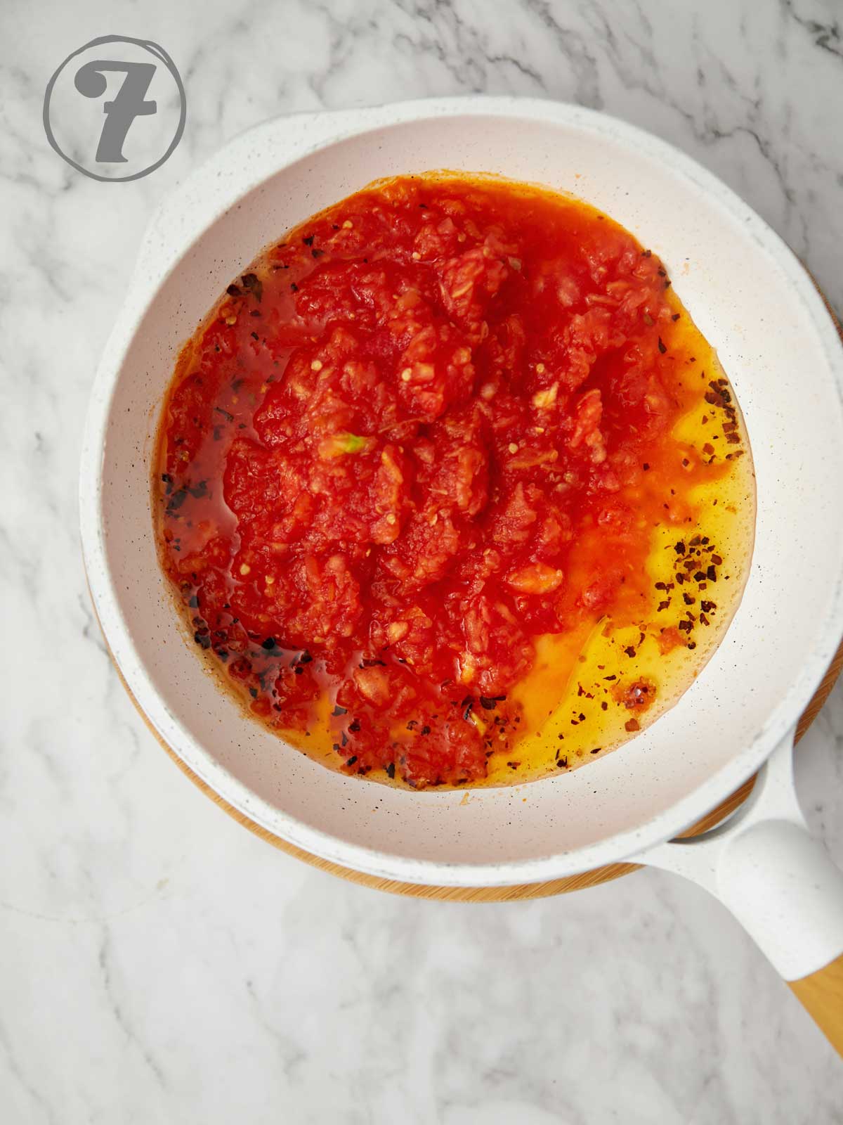 Tomatoes added to the saute pan.