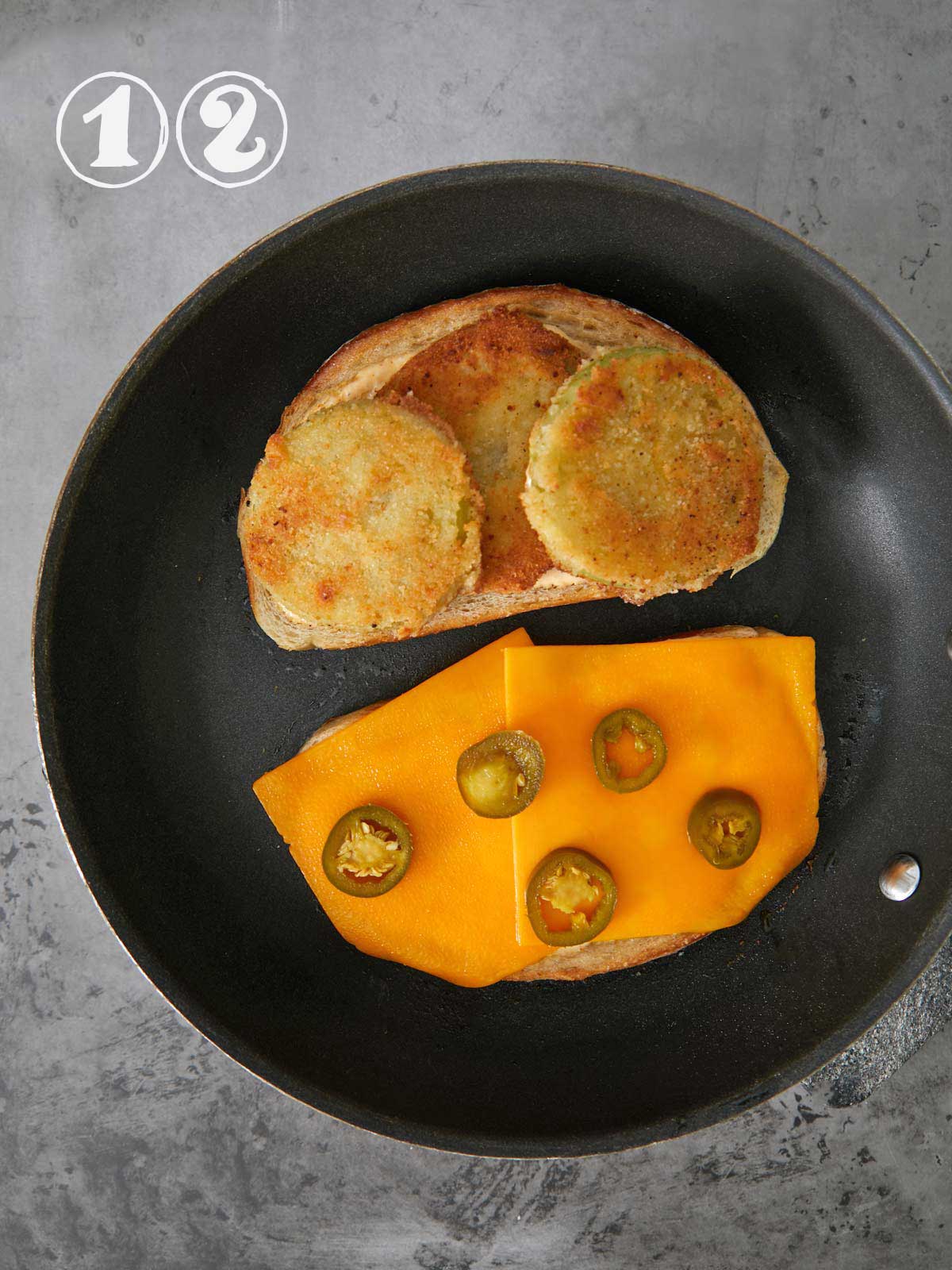 A black pan for frying green tomato sandwiches.