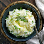 A traditional Irish colcannon recipe consisting of mashed potatoes and green onions.
